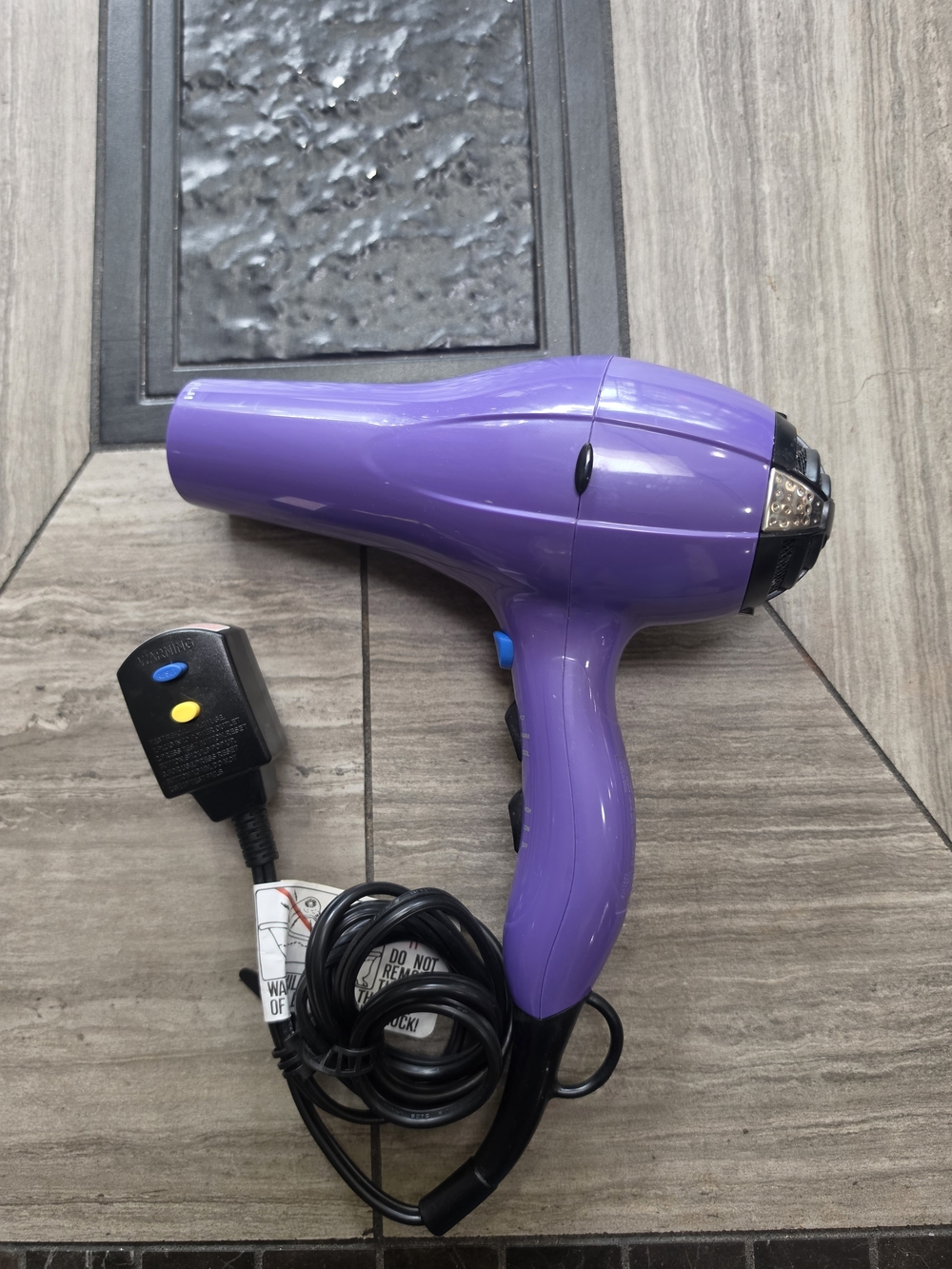 Conair Infinity Pro Portable Hair Dryer in Purple with Simple Controls
